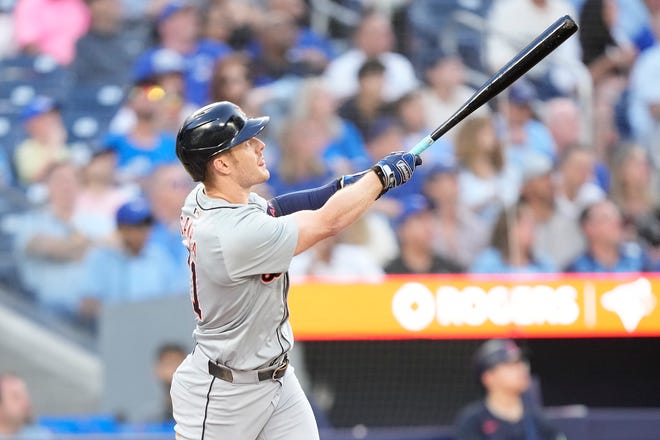 Detroit Tigers designated hitter Mark Canha (21) hits a two-run home run against the Toronto Blue Jays in the fourth inning at Rogers Centre in Toronto, Friday, July 19, 2024.