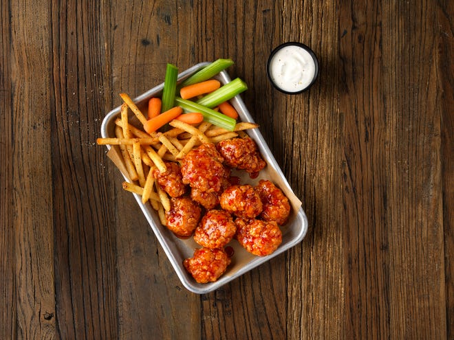 With a $10 online order at Buffalo Wild Wings on Monday, July 29, you get a voucher for six free wings with the purchase of any burger on your next visit.