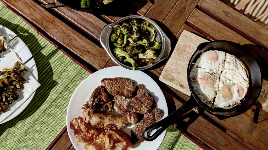 Steak platter, grilled broccoli bowl and fried egg skillet