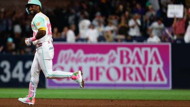 Jurickson Profar (10) circles the bases after a ninth-inning home run. (Meg McLaughlin/The San Diego Union-Tribune)