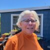 Judith Dambowic, a multiple myeloma patient, on her porch in Oakland, California, just before she shaved her head in preparation for a stem cell transplant in May. Dambowic wanted California to pass a law regulating Medigap insurance policies. The reform, which ultimately failed, would have made it easier for her to switch from Medicare Advantage to traditional Medicare.