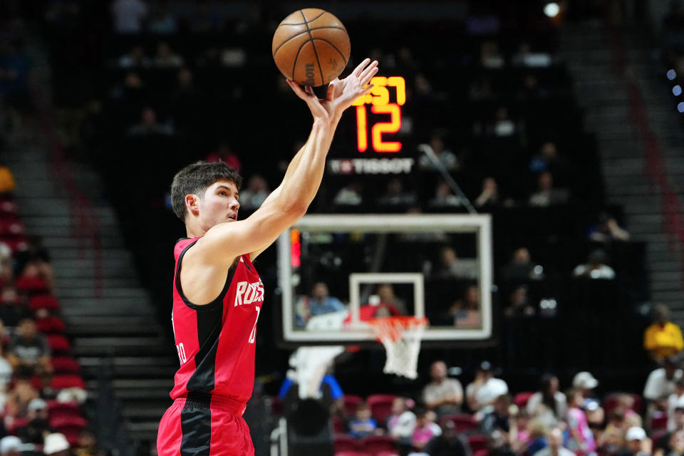 July 14, 2024; Las Vegas, NV, USA; Houston Rockets guard Reed Sheppard (15) shoots against the Washington Wizards during the third quarter at Thomas & Mack Center. Mandatory Credit: Stephen R. Sylvanie-USA TODAY Sports