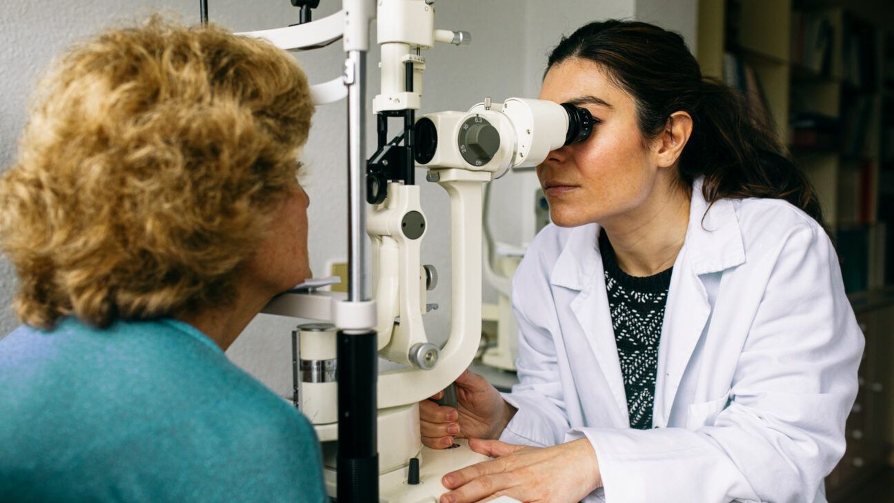 A woman undergoes an eye exam.