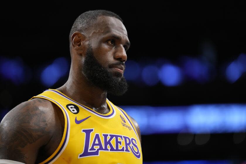 Lakers forward LeBron James looks down at the floor during a 2023 playoff game