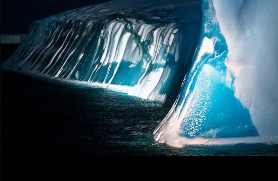 Nighttime encounter with a striped jade iceberg; view from the French icebreaker L'Astrolabe, 1st night outing from Dumont D'Urville station #Antarctica 2 weeks ago, heading to Hobart. In an upside down iceberg, the 