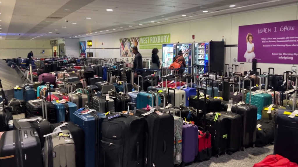 Sea of ​​baggage at Logan as carrier struggles to recover from IT crisis