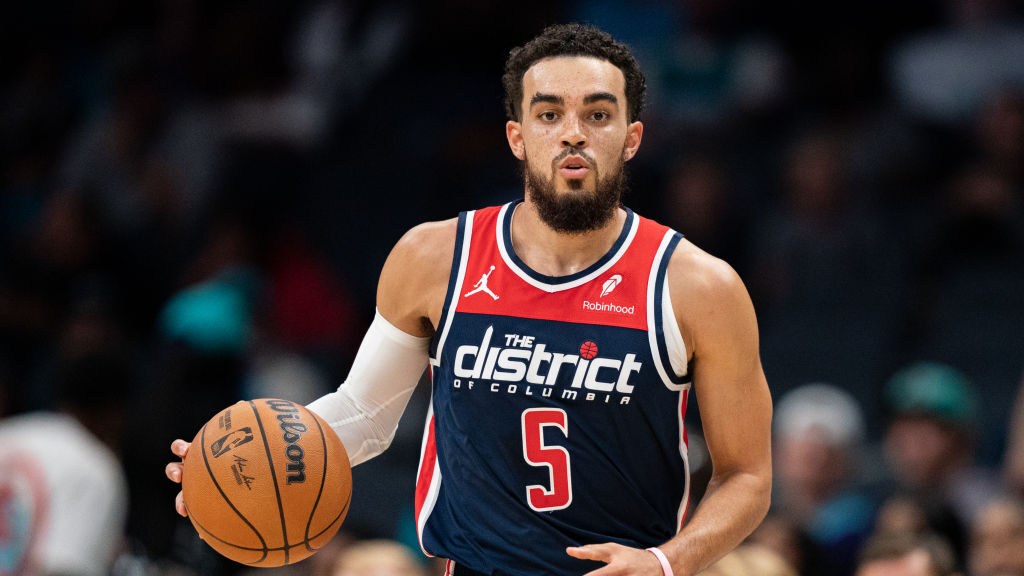 Tyus Jones #5 of the Washington Wizards brings the ball up court in the first quarter during their ...