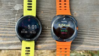 The Samsung Galaxy Watch Ultra (right) and Garmin Forerunner 965 (left) display post-run summaries of distance, time and pace.