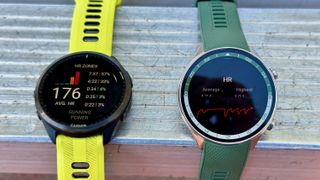 The Garmin Forerunner 965 (left) and the OnePlus Watch 2R (right)