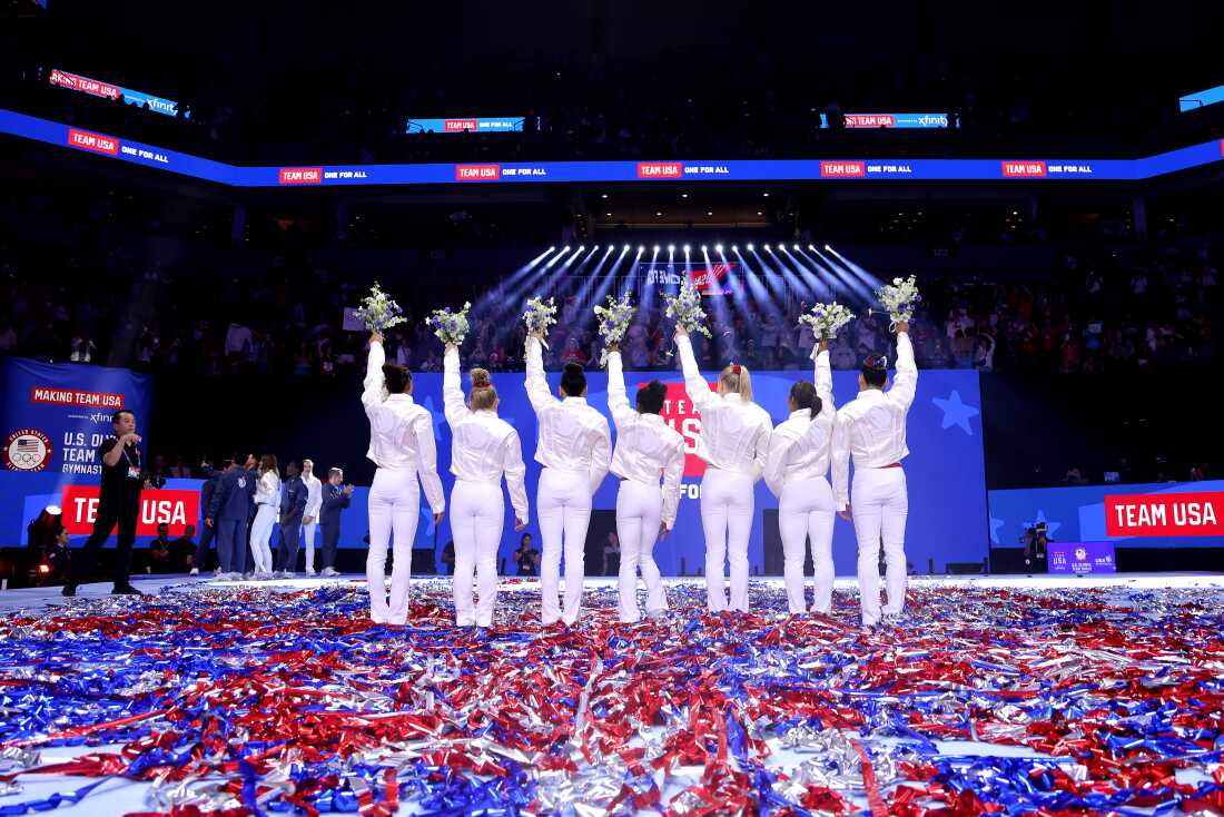 From left, Hezly Rivera, Joscelyn Roberson, Suni Lee, Simone Biles, Jade Carey, Jordan Chiles and Leanne Wong pose after being selected to the 2024 U.S. Women's Olympic Gymnastics Team on day four of the 2024 U.S. Olympic Team Gymnastics Trials in Minneapolis.