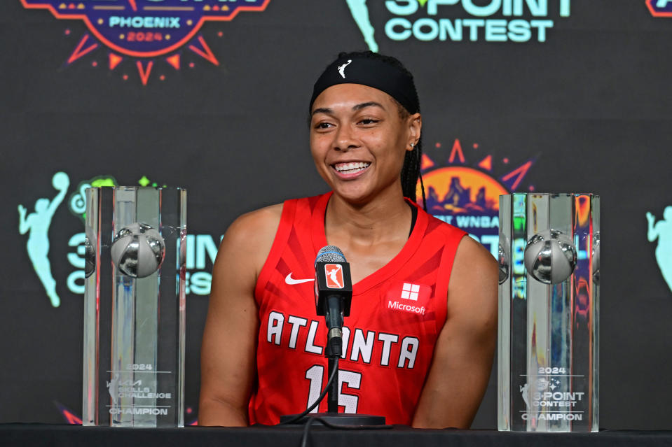 PHOENIX, AZ - JULY 19: Allisha Gray #15 of the Atlanta Dream speaks to the media after winning the Kia Skills Challenge and Starry 3 Point Contest on July 19, 2024 at Footprint Center in Phoenix, Arizona. NOTE TO USER: User expressly acknowledges and agrees that by downloading and/or using this photograph, user consents to the terms and conditions of the Getty Images License Agreement. Mandatory Copyright Notice: Copyright 2024 NBAE (Photo by Kate Frese/NBAE via Getty Images)