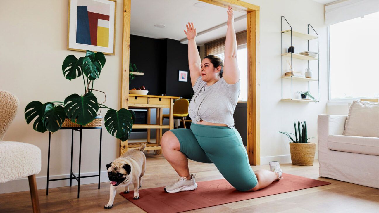 A woman exercising at home.