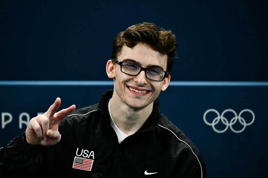 Stephen Nedoroscik throws a peace sign during the men's artistic gymnastics qualifying session at the Bercy Arena in Paris on Saturday.